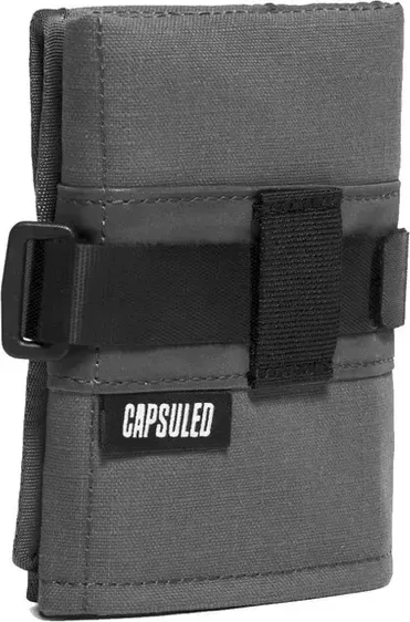 Capsuled Taška na cyklistické príslušenstvo Utility Bag Volcanic Ash, Čierna/Hnedá